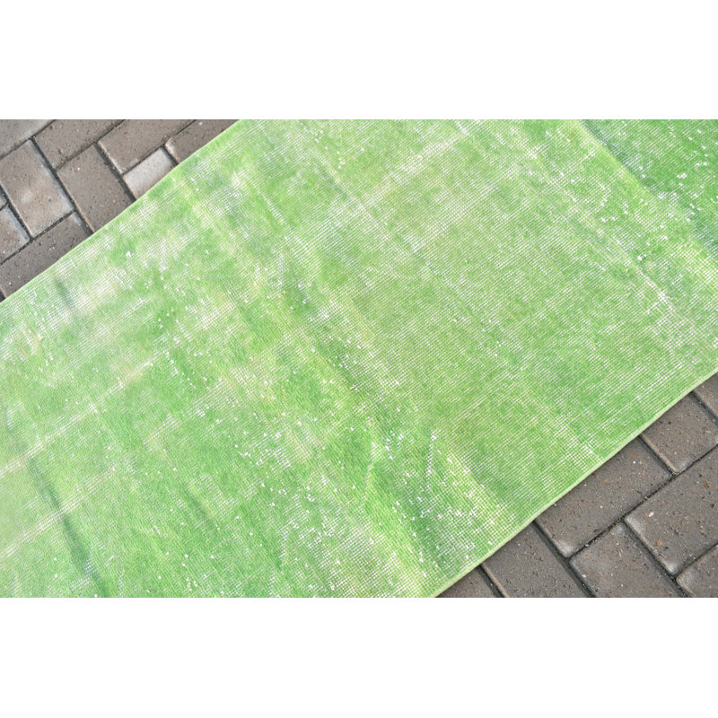 Tapis vintage rétro pour décoration intérieure et entrée de bureau en vert avec motif tribal