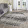 Riebe Black Area Rug