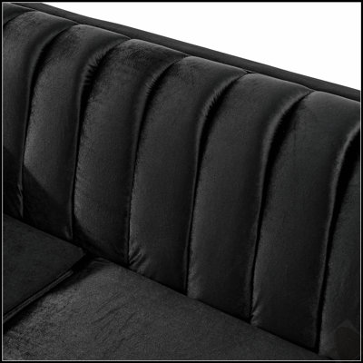 Canapé luxueux deux places en velours capitonné avec des accents métalliques et une texture brodée pour une décoration de salon élégante