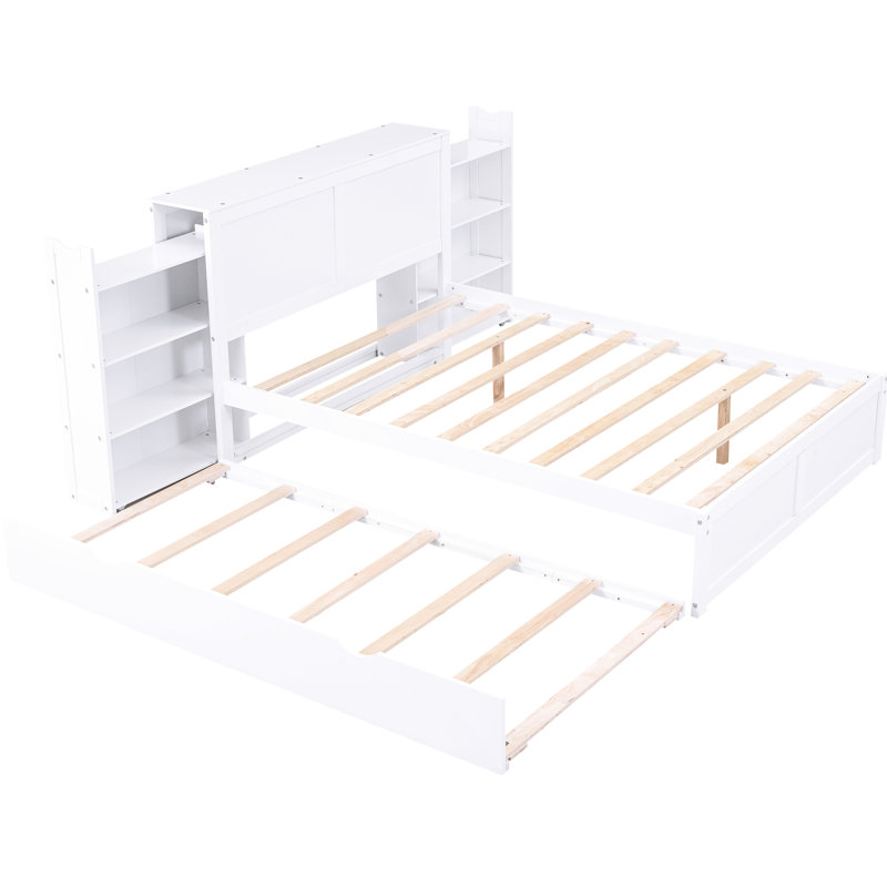 Lit plateforme double blanc avec 4 tablettes et lit gigogne simple - Fabrication en bois massif pour une chambre spacieuse avec rangement escamotable dans un environnement serein
