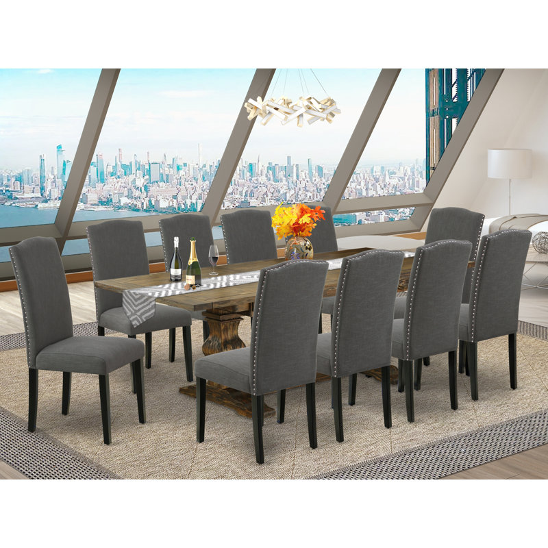 L'ensemble de salle à manger 11 pièces comprend une table de salle à manger rectangulaire avec rallonge amovible et 10 chaises rembourrées en tissu Gotham