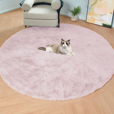 Tapis rond en aloisia avec envers antidérapant