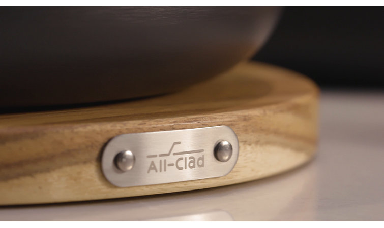 All-Clad HA1 Non-Stick 6-Qt. Dutch Oven with Lid, Acacia Wood Trivet and  Spoon + Reviews