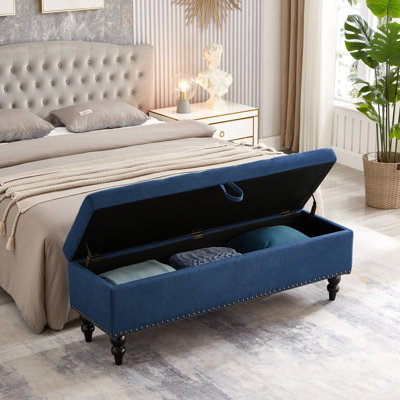 Banc de lit 59 po en tissu bleu avec compartiment de rangement. Multifonctionnel pour différentes pièces. Conception à boutons. Pieds en bois massif. Capacité de poids de 500 lb. Facile à assembler. Utilisation en haut. Assemblage à charge