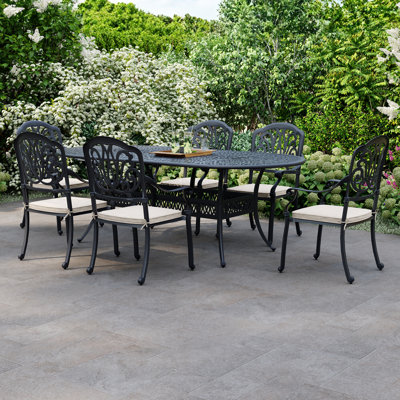Chetek 6 - Person Patio Dining Set with Oval Table , Cushions Included