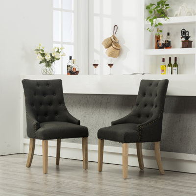 Fauteuil capitonné Authement