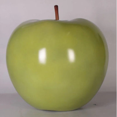 Grande statue de pomme verte surdimensionnée