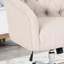Élégante chaise de bureau beige avec capitonnage à boutons et dossier ergonomique contemporain pivotant