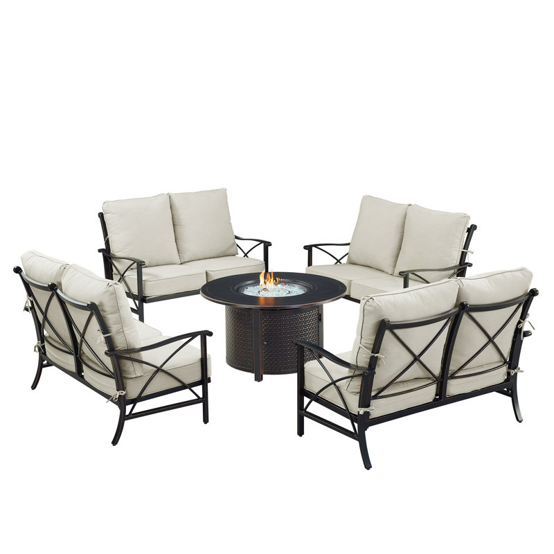 Ensemble de table de foyer en aluminium noir avec quatre causeuses profondes
