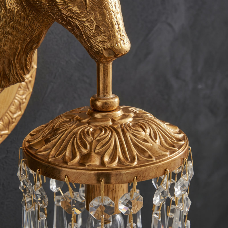 Lampe murale en laiton et cristal