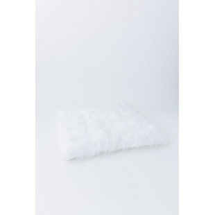 Matelas à poils longs blanc de luxe
