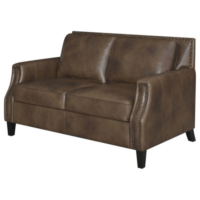 Brown Sugar Upholstered Recessed Arms , High Back For Posture Improvement, Self - Welt Trimmed Seat And Medium Hammered Antique Brass Nailheads On Inside Top