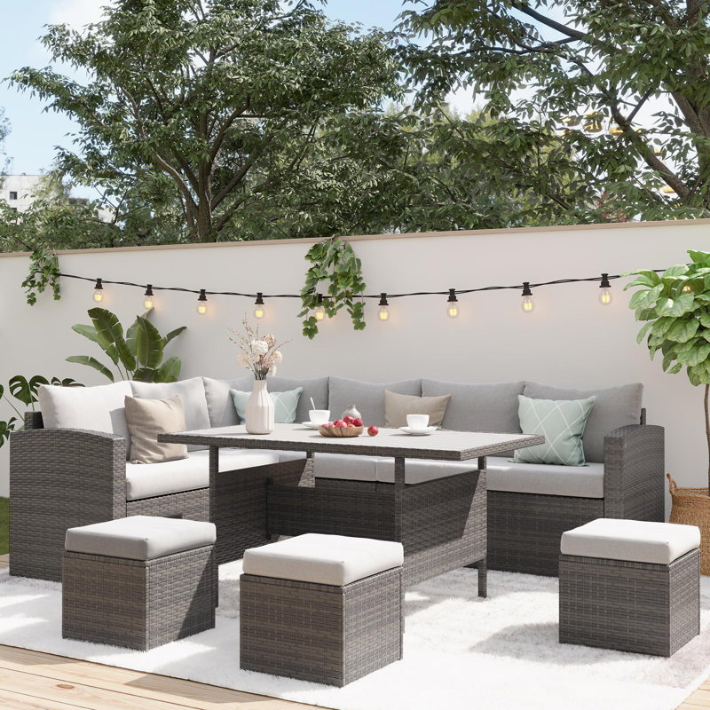 Cueva 7 Piece Rattan Sectional Seating Group with Cushions, Grey
