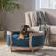 Lit moyen pour animal de compagnie en tissu bleu marine, de style contemporain avec coutures en losange et structure en bois de bouleau