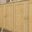 Commode rustique avec portes en rotin et pieds en bois massif