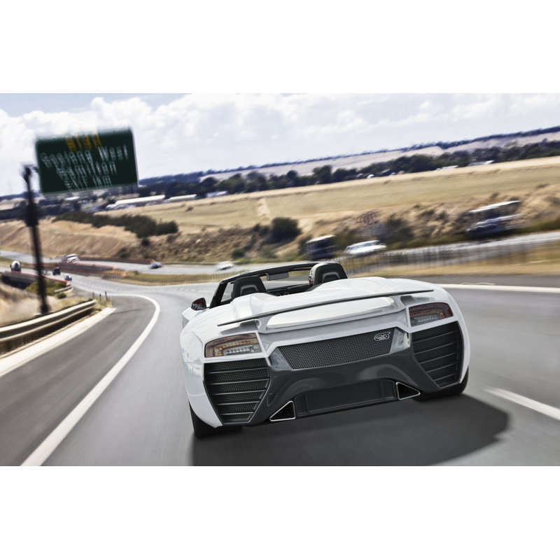 Sports car on freeway, 51cm H x 76cm W