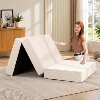 Matelas futon pliable en trois parties (15 cm) pour lit simple, en mousse haute densité, avec housse amovible et lavable, base antidérapante et poignées de transport. Parfait pour les chambres d'amis, le camping ou le dortoir.