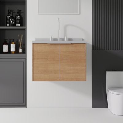 Meuble-lavabo suspendu de 61 cm (24 po) avec comptoir et dosseret en marbre reconstitué, armoire en contreplaqué, lavabo en céramique, portes à fermeture amortie, noyer