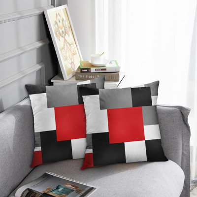 Housses de coussin géométriques rouges, noires et grises