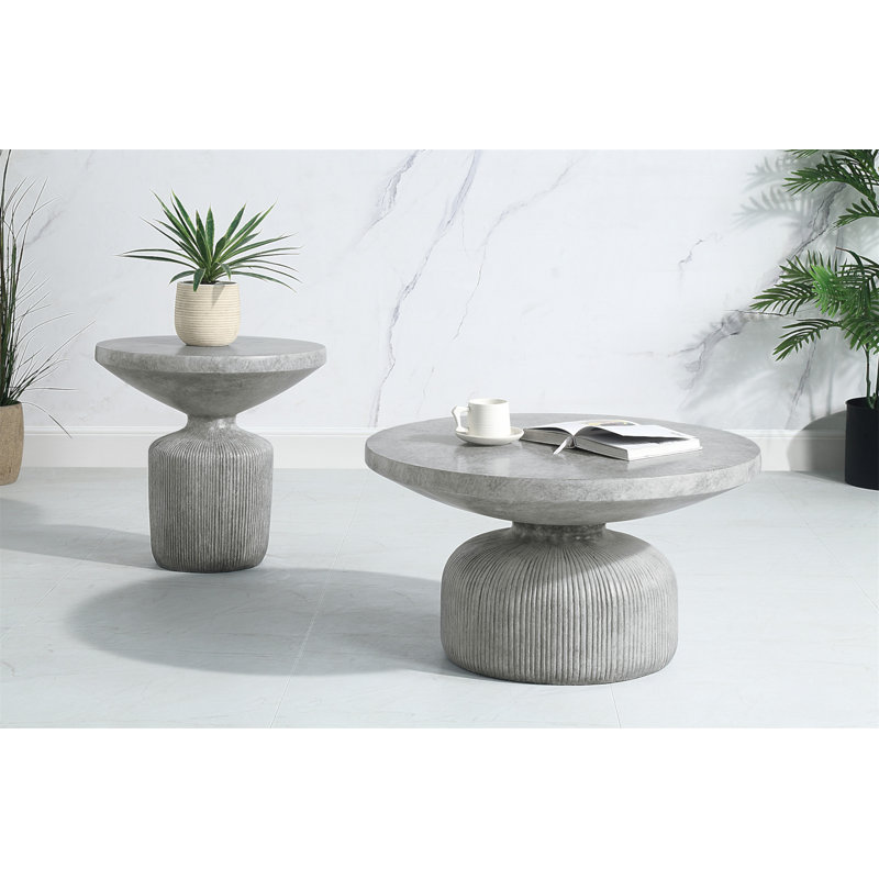 Table basse grise patinée avec plateau rond et base piédestal