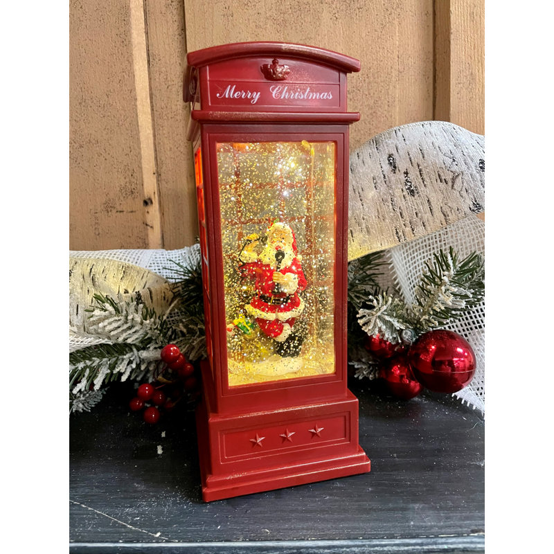 Père Noël dans une lanterne à piles