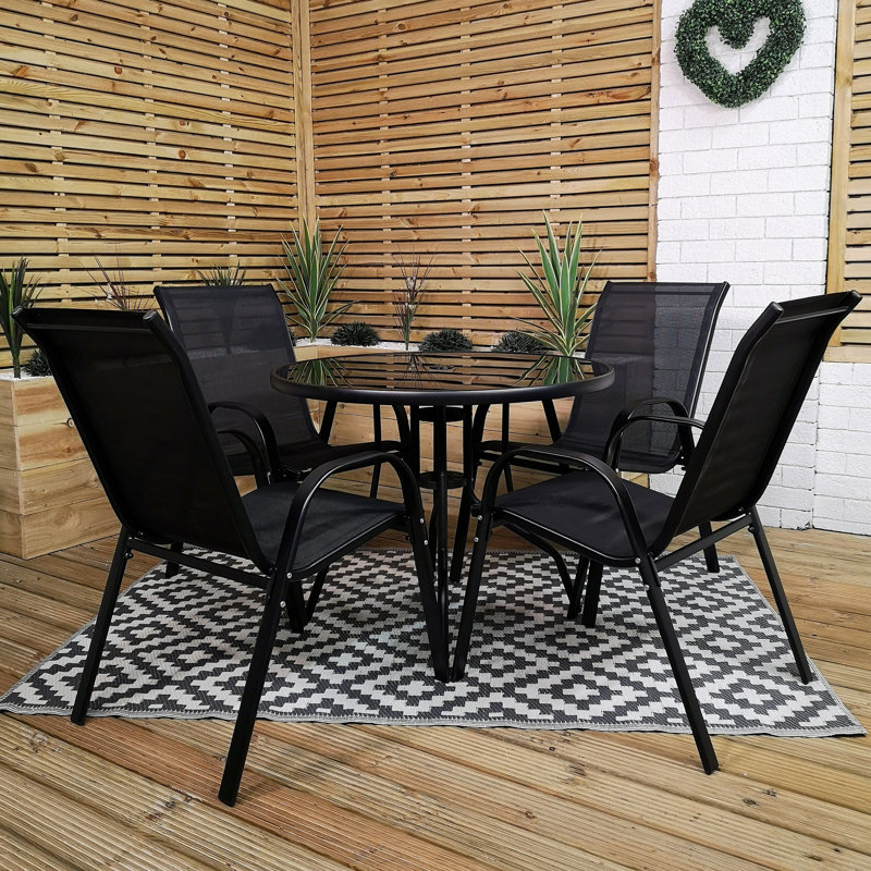Anaum 4 - Person Patio Dining Set with Round Table