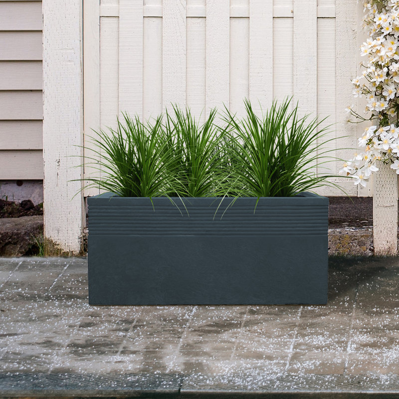 Boîte à fleurs en béton