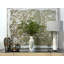 Organic Modern Smilax Arranged in a Ceramic Leaf Vase