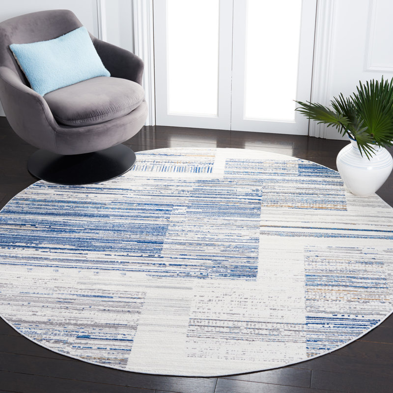 Tapis ivoire / bleu à motif abstrait Hobgood, Rond 6 pi 7 po