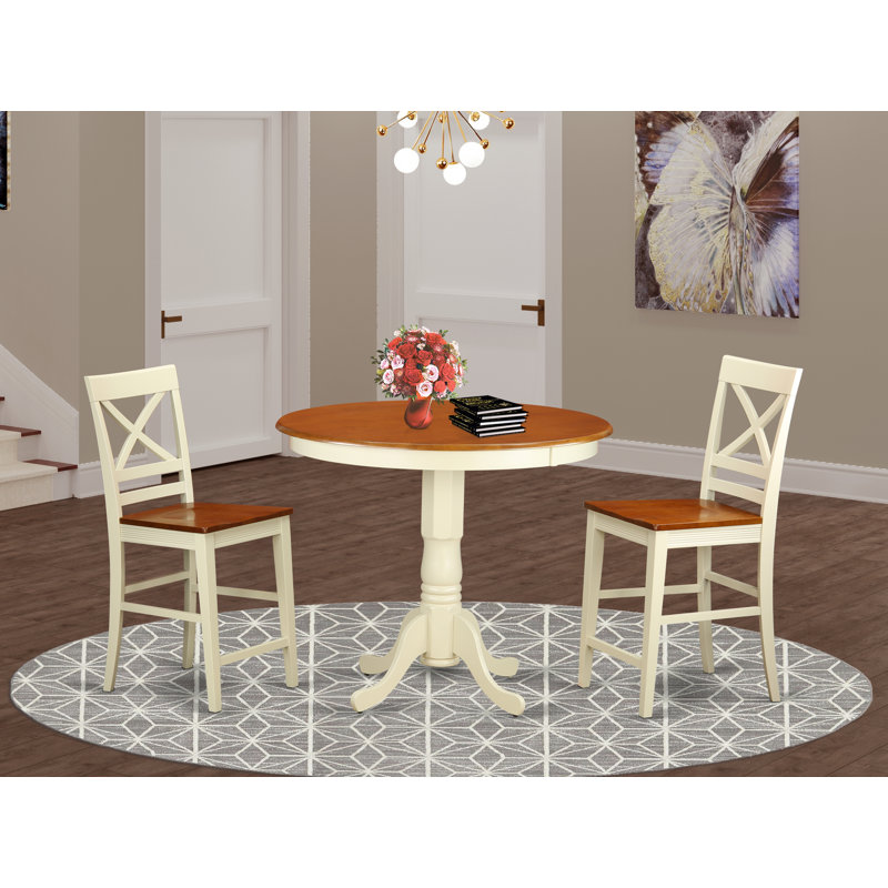 L'ensemble de table de salle à manger 3 pièces à hauteur de comptoir comprend une table ronde en bois avec piédestal et 2 chaises de cuisine, babeurre et cerise
