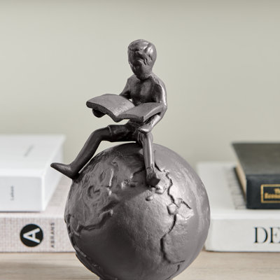 Jimesha Boy Reading on Globe Iron Paperweight & Sculpture