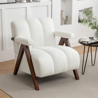 Fauteuil Draedyn rembourré avec pieds en bois massif