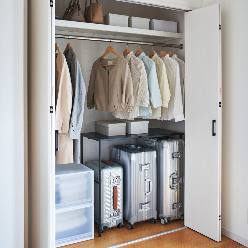Expandable Black Steel Suitcase Rack with Storage Bar