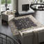 Sona Wool Oriental Area Rug in Black/Beige
