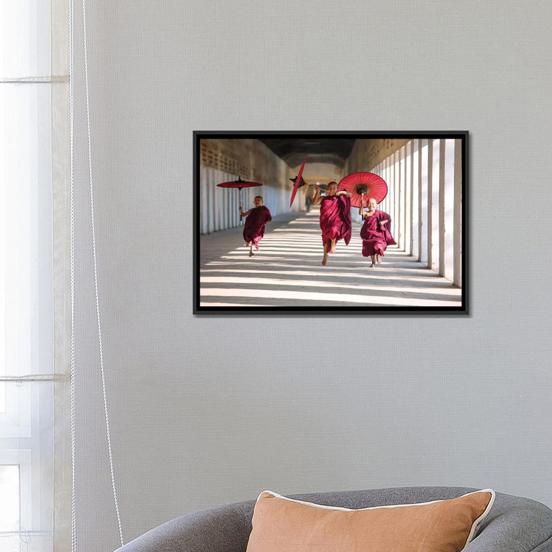 " Three Monks Running, Burma " by Matteo Colombo, 18" H x 26" W x 1.5" D, Black Floater Framed Canvas, No Mat