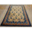 Tapis ivoire antique en laine Kansu
