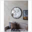Miroir rond Theodor avec design industriel et cadre en métal