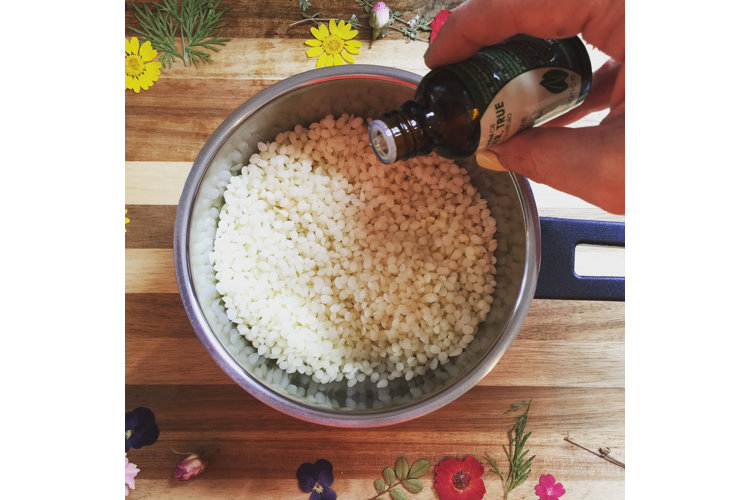 Add oil in the beeswax.
