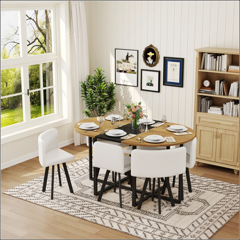 Ensemble de table de salle à manger 7 pièces ovale avec grain de bois fixe et plateau en triamine noire et 6 chaises en similicuir blanc, parfait pour les petits espaces et les cuisines modernes
