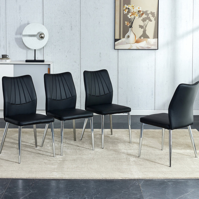 Quatre chaises de salle à manger en polyuréthane noir - Design moderne avec métal pour le restaurant et le salon