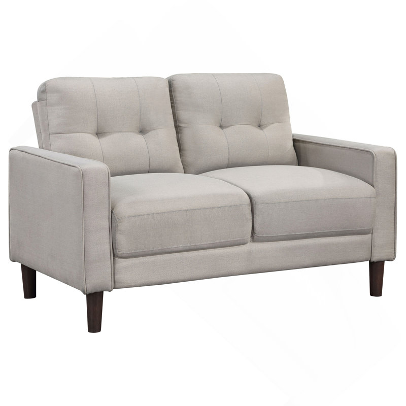 Causeuse capitonnée beige