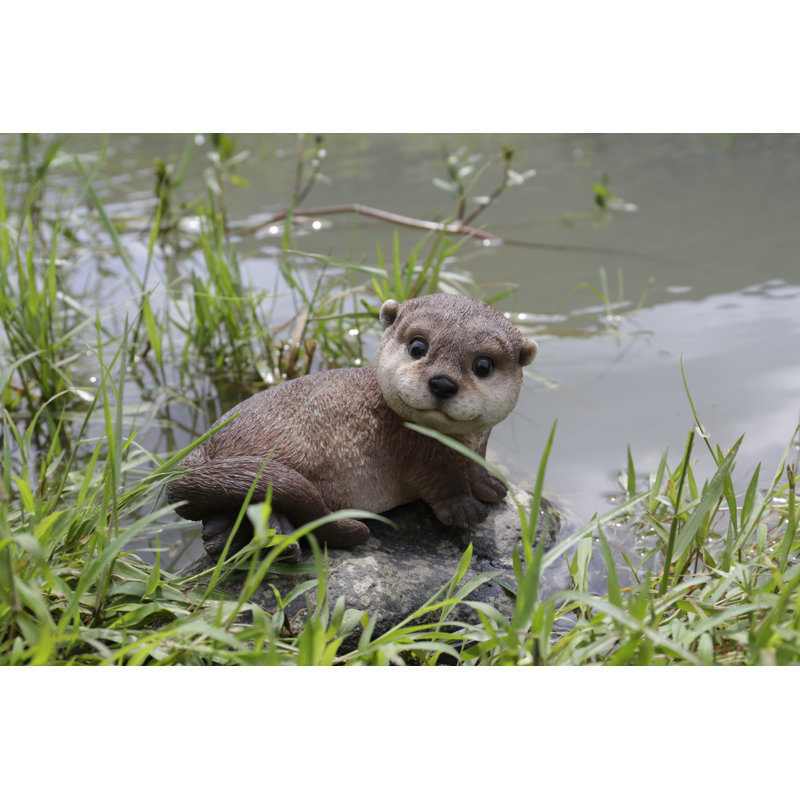 Otter Laying Back Statue