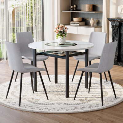 Table and chair set.42 inch modern minimalist white desktop round dining table set.Paired with 4 Light Gray Linen Dining Chairs With Curved Widened Cushion. Suitable for dining rooms,office,etc.