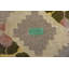 Tapis antique crocheté à losanges