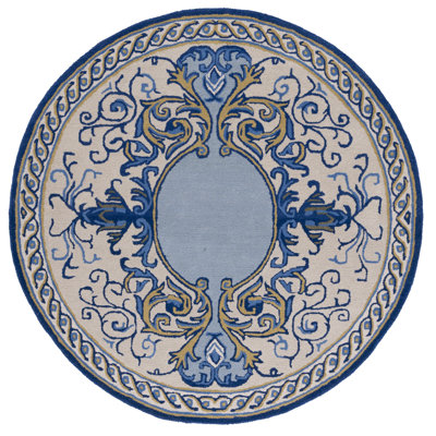 Empire Hand Tufted Wool/Cotton Oriental Rug in Blue/Ivory