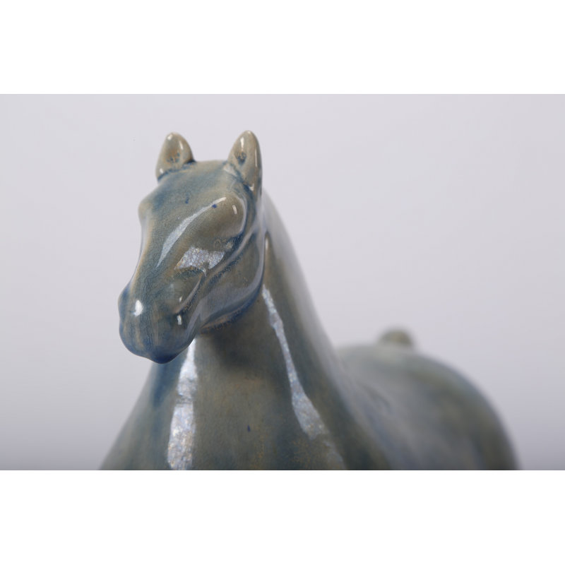 Figurine cheval trotteur