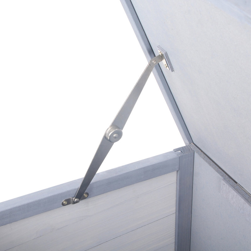 Chenil en bois gris avec toit imperméable