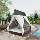 Luxurious Outdoor Daybed With Privacy Curtains And Multiple Pillows For Ultimate Comfort