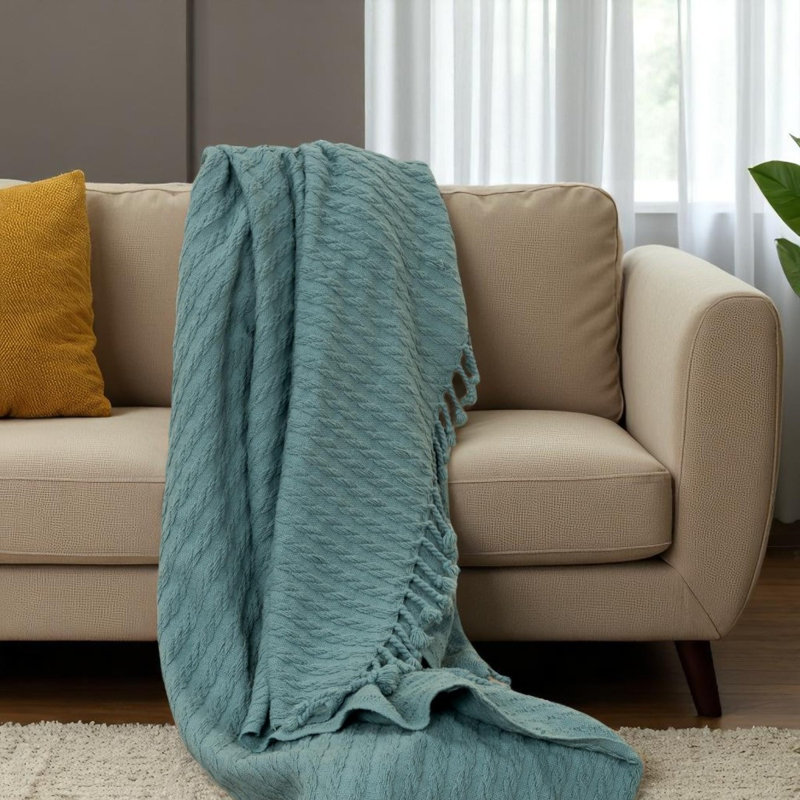 Jeté 50 "x 60" en tricot de coton bleu sarcelle avec pampilles