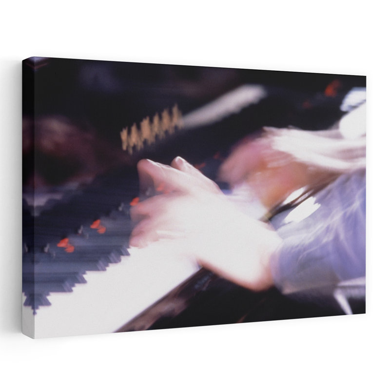 Long Exposure Shot Of Hands Of Piano Player Playing Instrument Japan by Collezione Panoramica - Wrapped Canvas Print